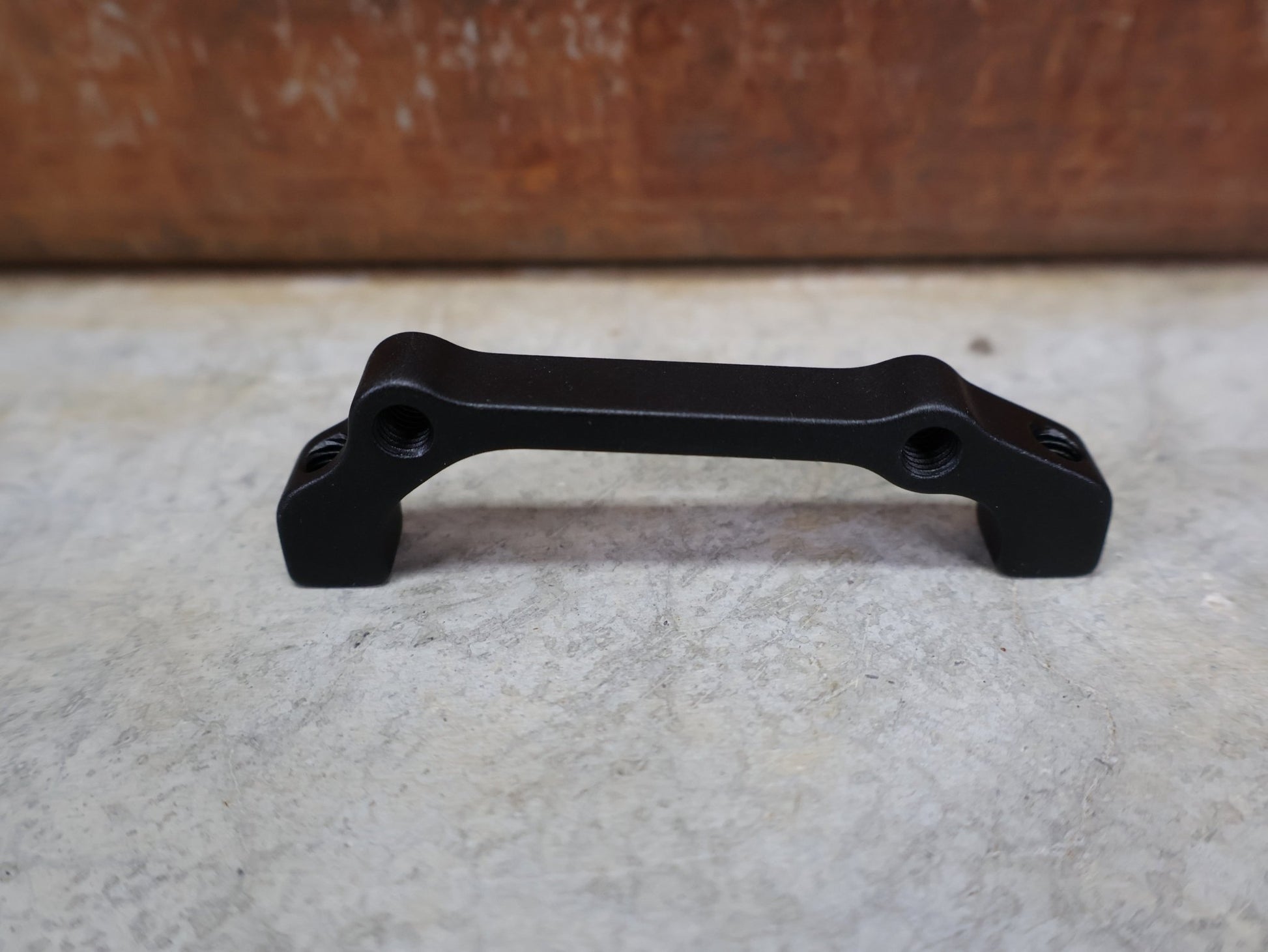 Zubehör von Sram, SRAM BREMSADAPTER +20 IS AUF PM FÜR VR 180 MM / HR 160 MM – 00.5318.009.001 vor USEDBIKES - OB.DE Hintergrund