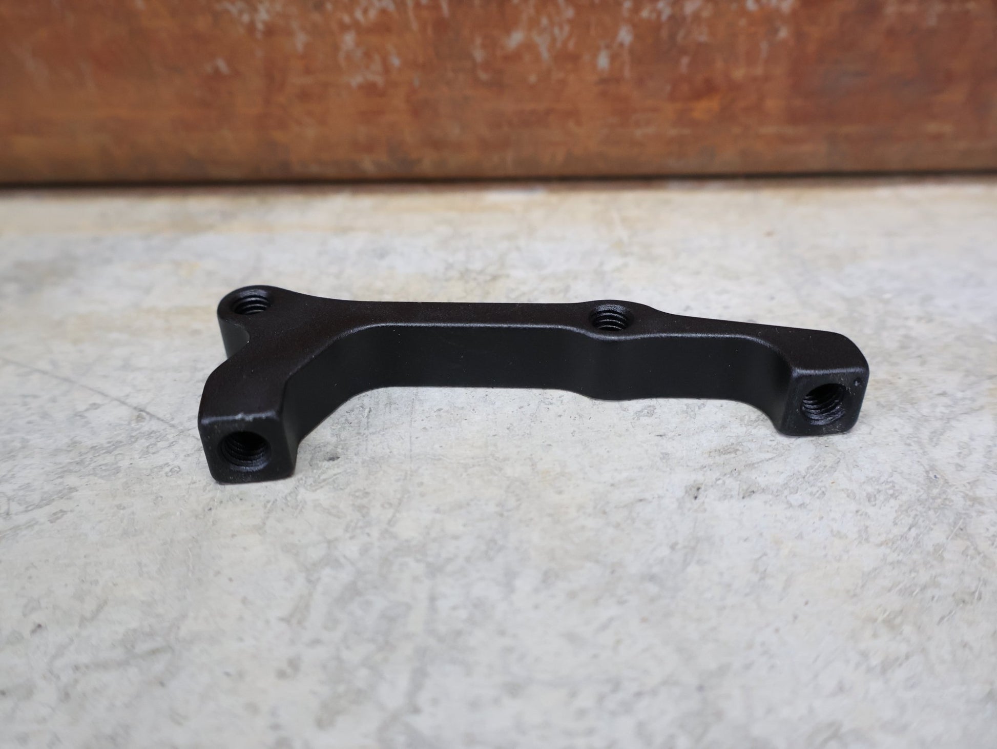 Zubehör von Sram, SRAM BREMSADAPTER IS AUF PM FÜR 200 MM ROTOR – 00.5318.009.003 vor USEDBIKES - OB.DE Hintergrund