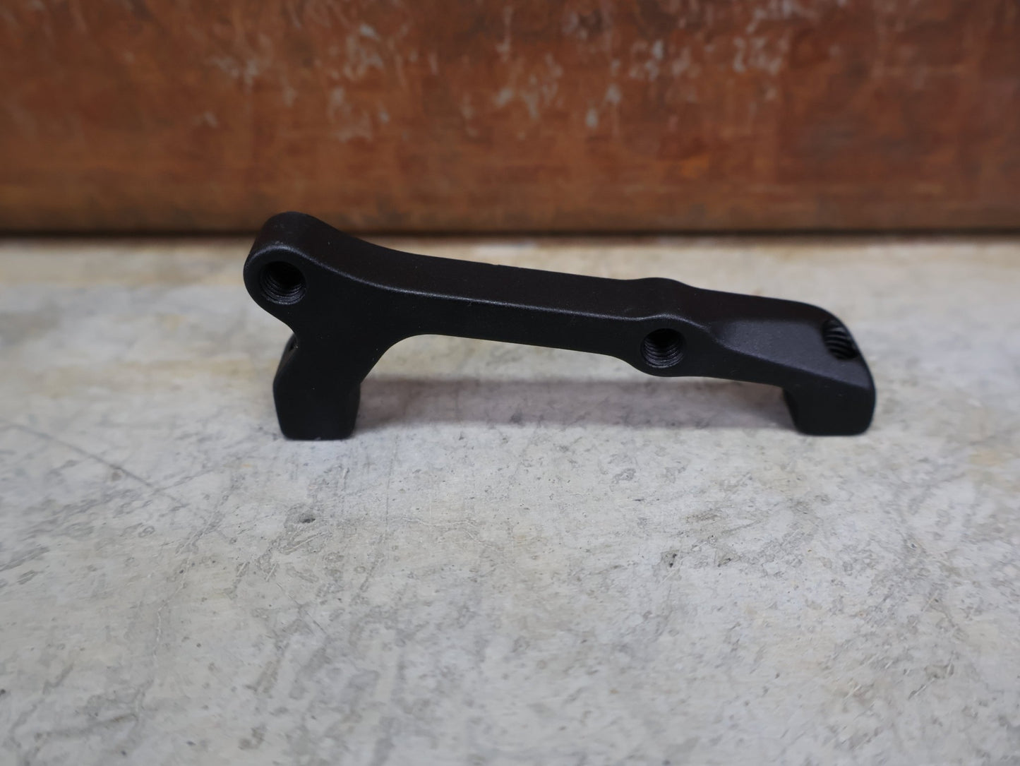 Zubehör von Sram, SRAM BREMSADAPTER IS AUF PM FÜR 200 MM ROTOR – 00.5318.009.003 vor USEDBIKES - OB.DE Hintergrund