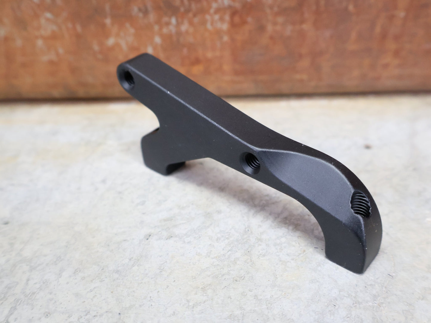 Zubehör von Sram, SRAM BREMSADAPTER IS AUF PM (RAHMEN) FÜR 200 MM ROTOR – 00.5318.009.004 vor USEDBIKES - OB.DE Hintergrund