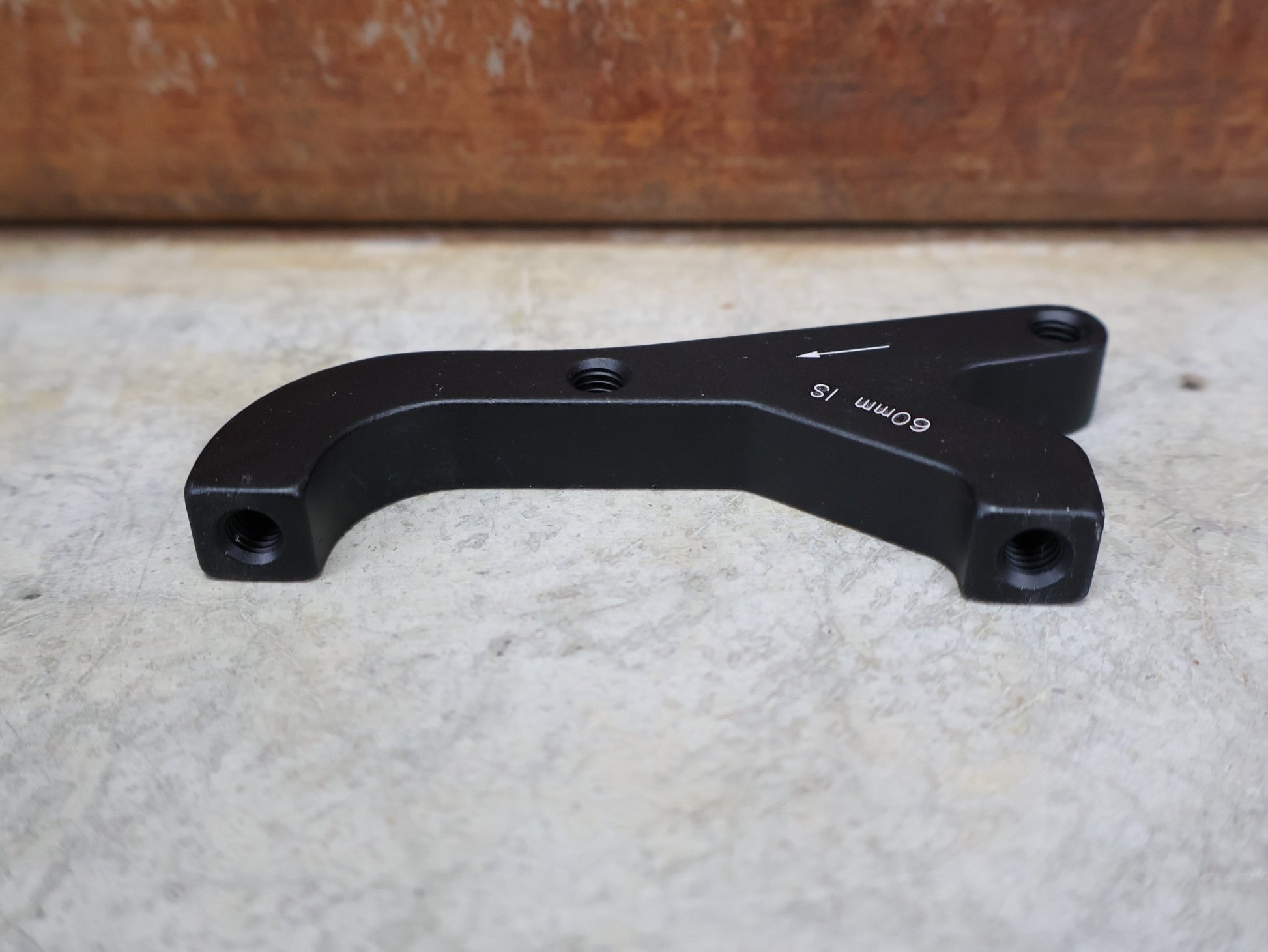 Zubehör von Sram, SRAM BREMSADAPTER IS AUF PM (RAHMEN) FÜR 200 MM ROTOR – 00.5318.009.004 vor USEDBIKES - OB.DE Hintergrund