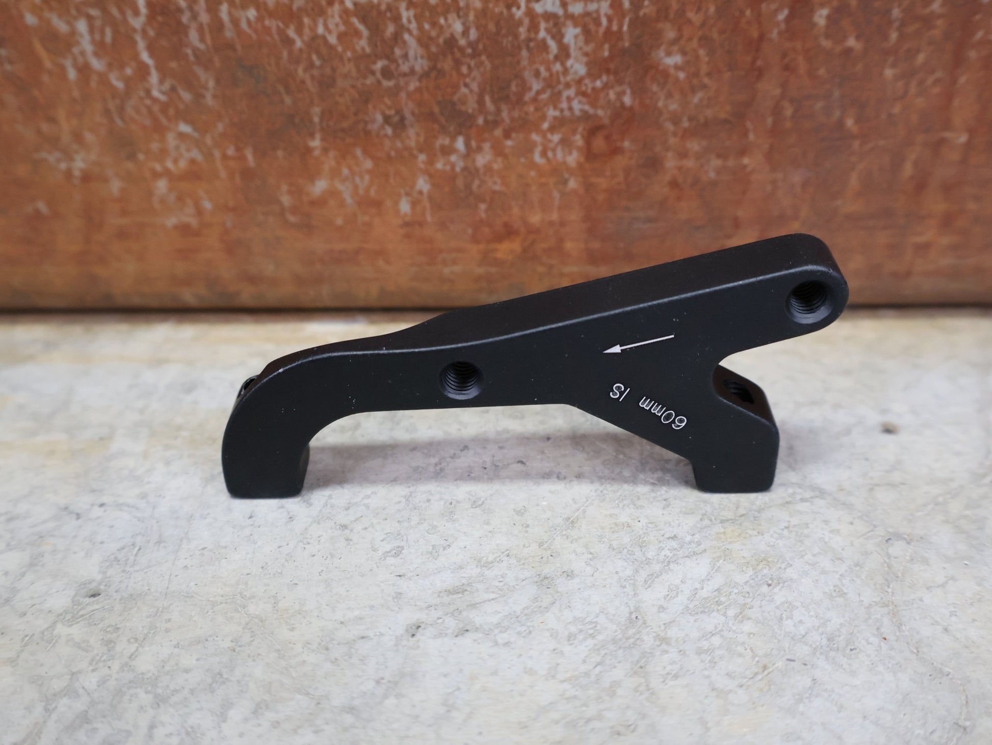 Zubehör von Sram, SRAM BREMSADAPTER IS AUF PM (RAHMEN) FÜR 200 MM ROTOR – 00.5318.009.004 vor USEDBIKES - OB.DE Hintergrund