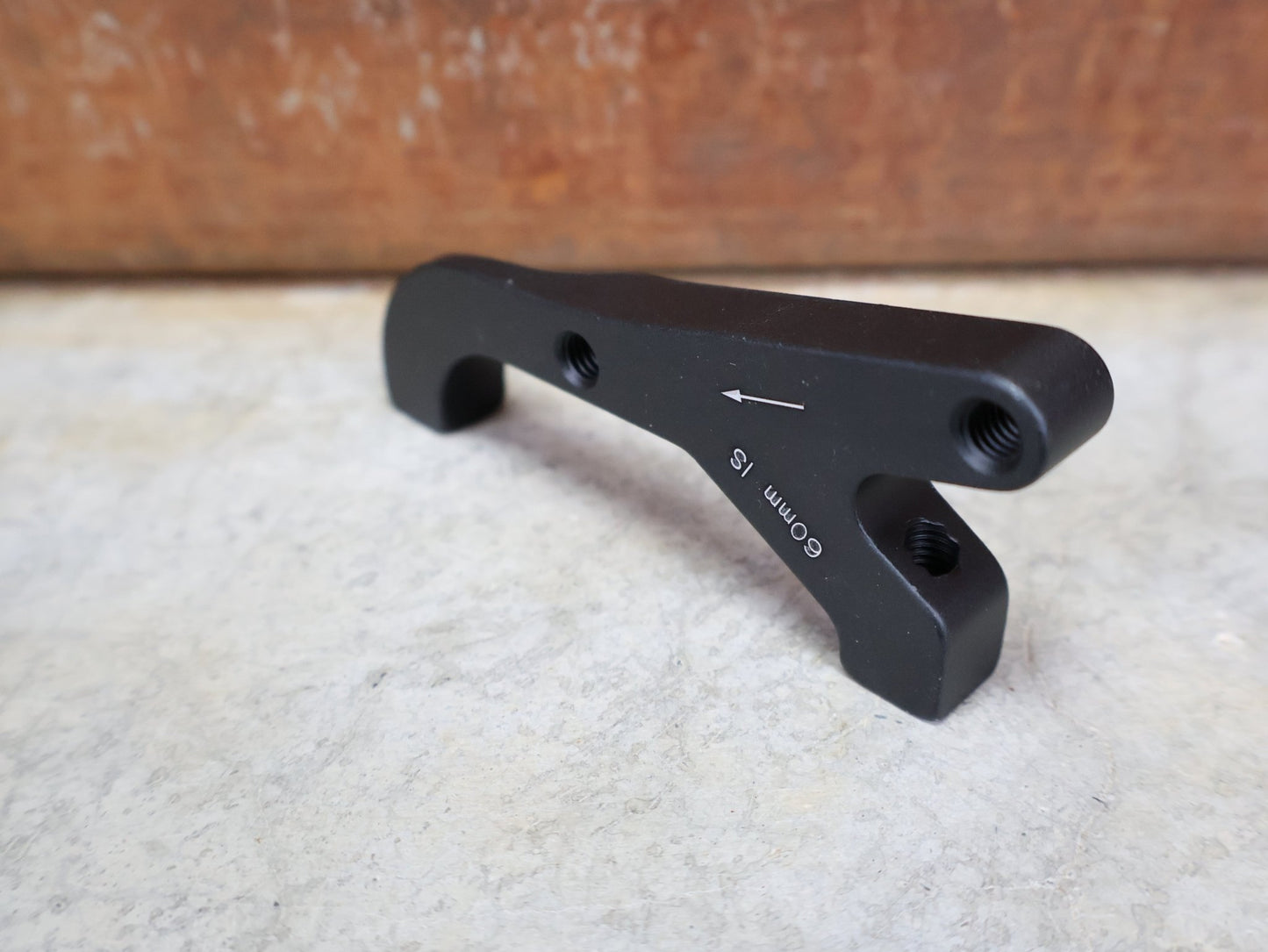 Zubehör von Sram, SRAM BREMSADAPTER IS AUF PM (RAHMEN) FÜR 200 MM ROTOR – 00.5318.009.004 vor USEDBIKES - OB.DE Hintergrund