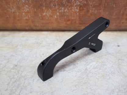 Zubehör von Sram, SRAM BREMSADAPTER IS AUF PM (RAHMEN) FÜR 200 MM ROTOR – 00.5318.009.004 vor USEDBIKES - OB.DE Hintergrund