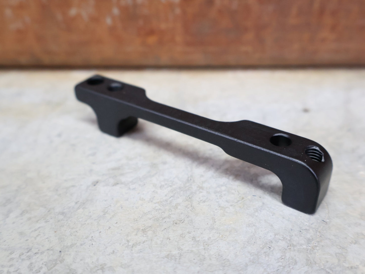 Zubehör von Sram, SRAM BREMSADAPTER PM 6" AUF PM – 40MM – 00.5318.007.003 vor USEDBIKES - OB.DE Hintergrund