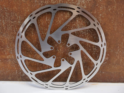 Bremsscheibe von Sram, SRAM CENTERLINE ROUNDED BREMSSCHEIBE 203 MM / 6-LOCH vor USEDBIKES-OB.DE Hintergrund