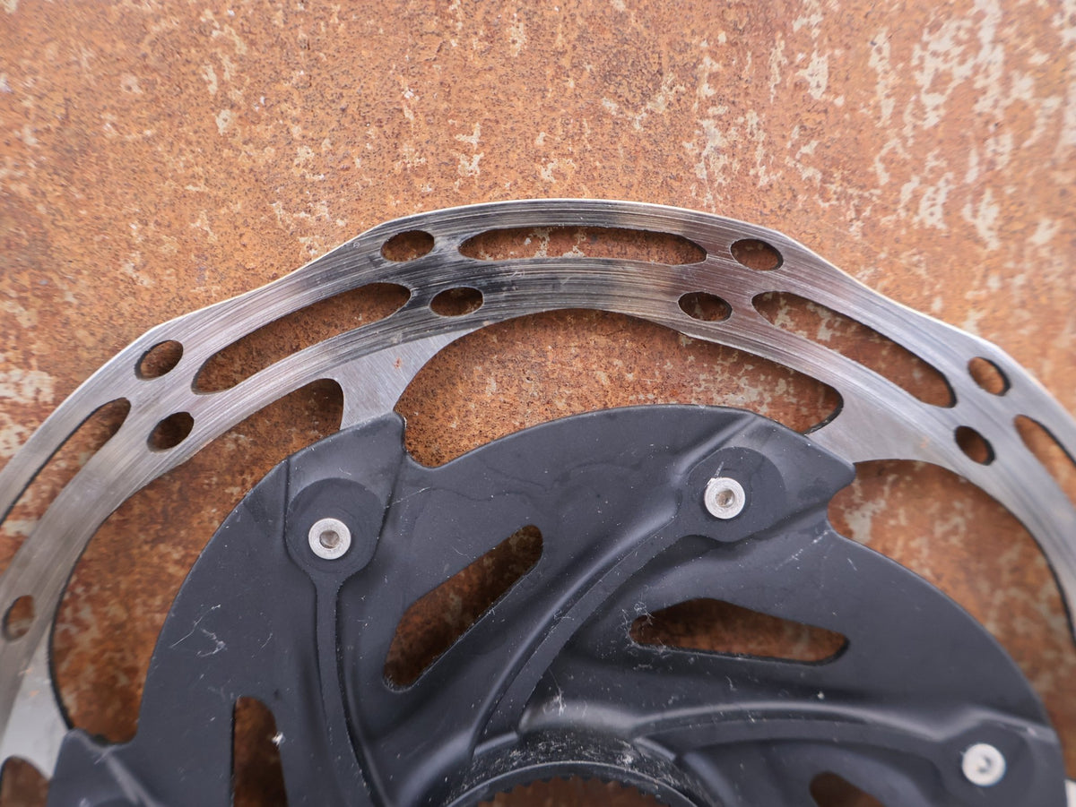 Bremsscheibe von Sram, SRAM Centerline XR Rounded Bremsscheiben Set 160mm CL 2x vor USEDBIKES-OB.DE Hintergrund