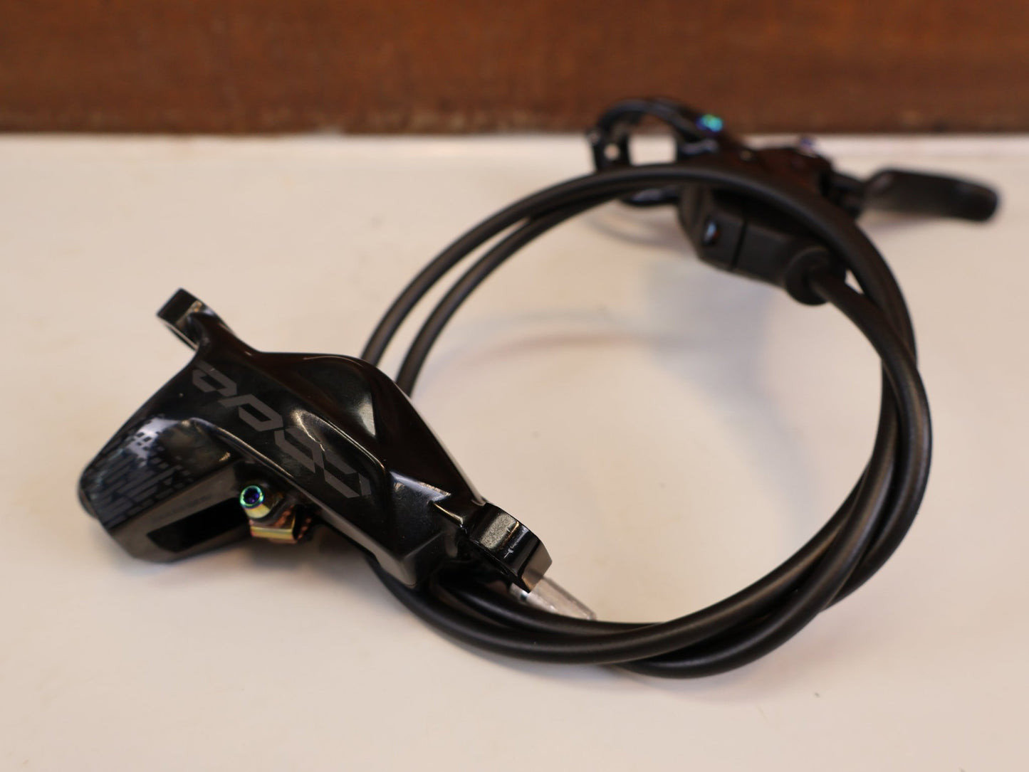 Bremse von Sram, SRAM CODE RSC SCHEIBENBREMSEN SET VR HR RAINBOW 200MM vor USEDBIKES-OB.DE Hintergrund