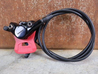 Bremse von Sram, SRAM DB - S - 900 - A1 SCHEIBENBREMSSATTEL – FLAT MOUNT / ROAD DISC vor USEDBIKES - OB.DE Hintergrund