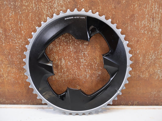 Kettenblatt von Sram, SRAM FORCE AXS KETTENBLATT / 48 ZÄHNE LOCHKREIS 107 MM / 8-BOLT 12-FACH vor USEDBIKES-OB.DE Hintergrund