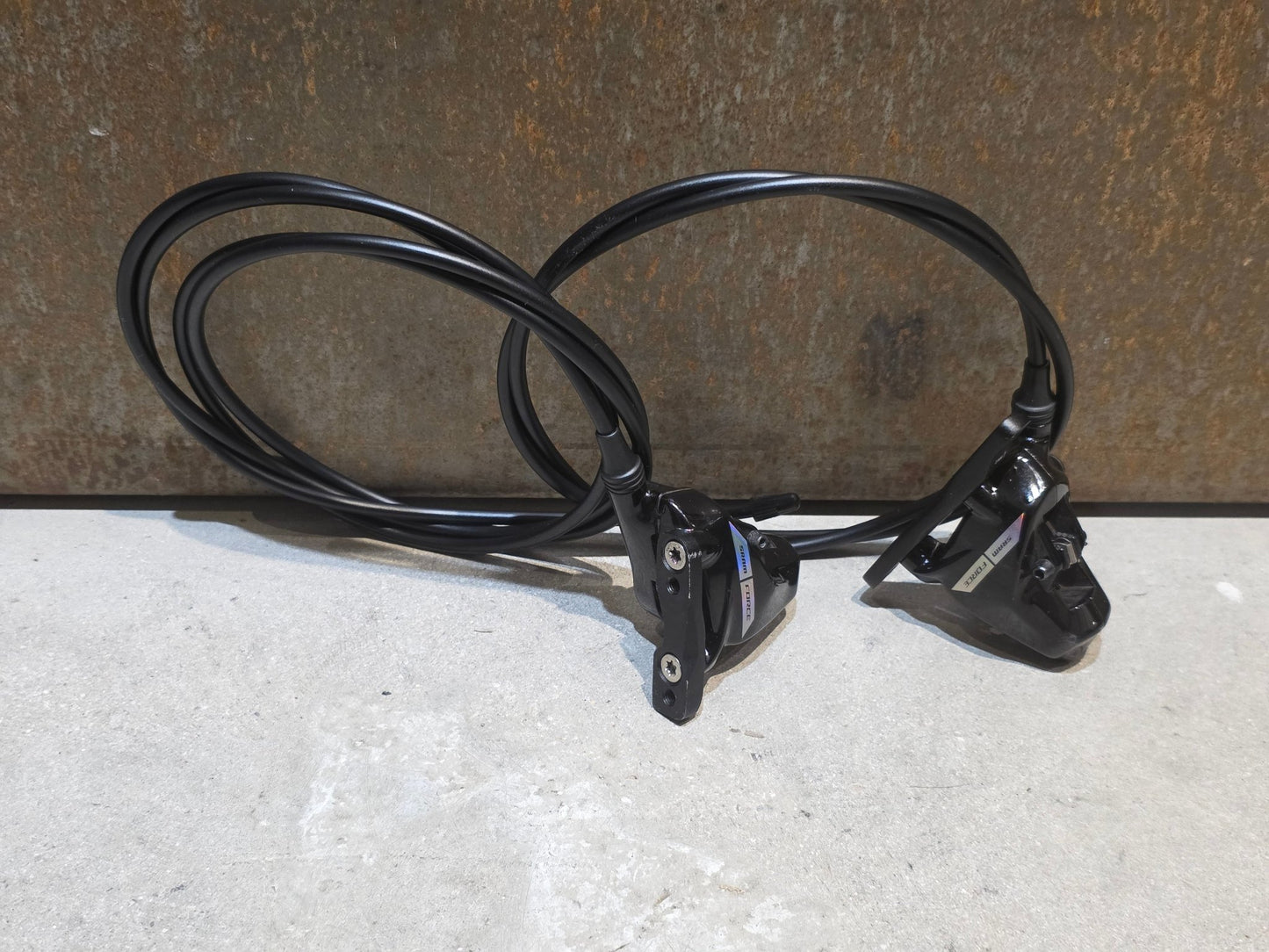 Brems - / Schalthebel von Sram, SRAM FORCE D2 AXS HRD AXS BREMS - / SCHALTHEBEL DISC / SET vor USEDBIKES - OB.DE Hintergrund