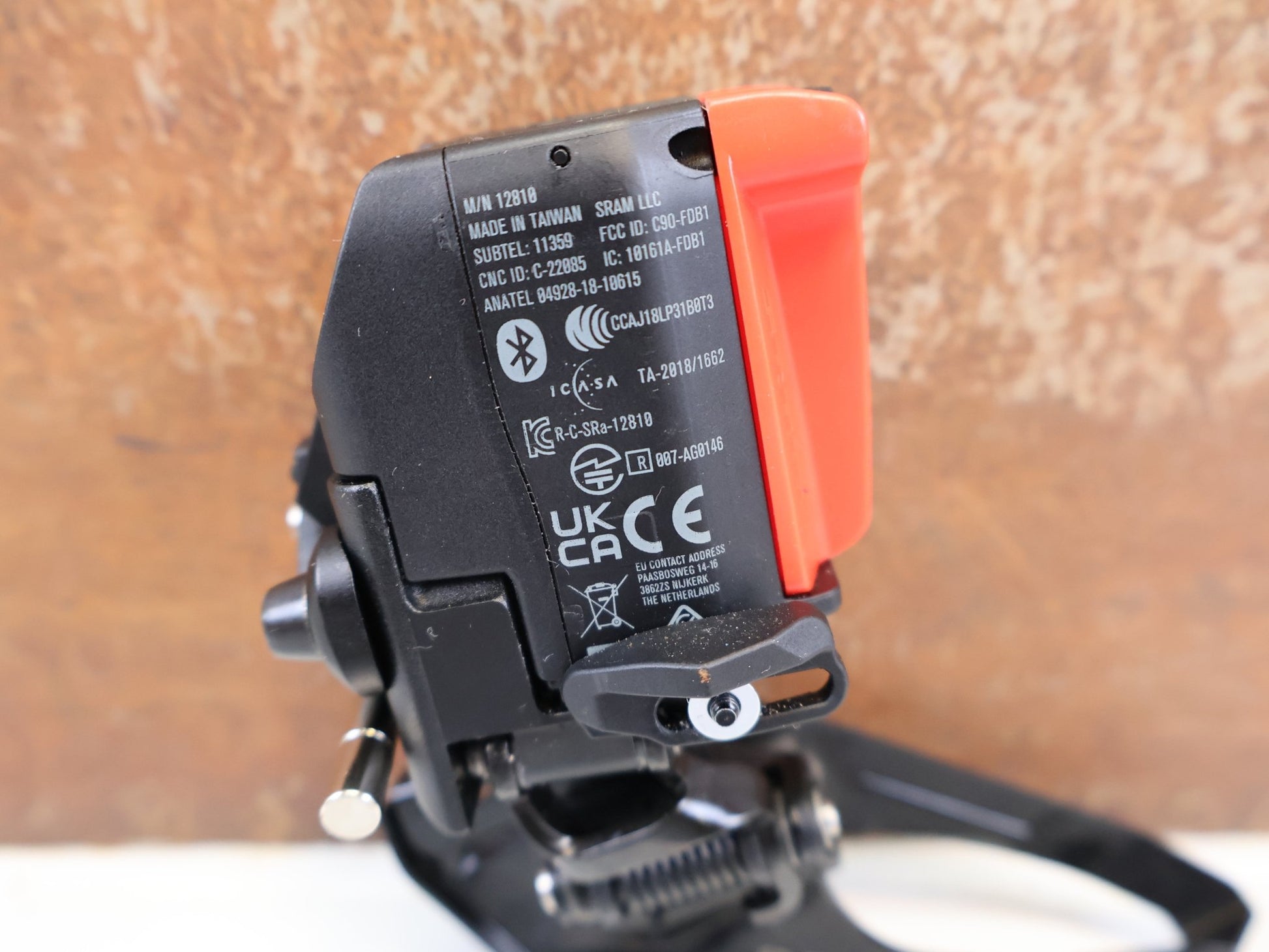 Schaltungsteile von Sram, SRAM FORCE E1 AXS UMWERFER 2X12 FACH ANLÖT vor USEDBIKES-OB.DE Hintergrund