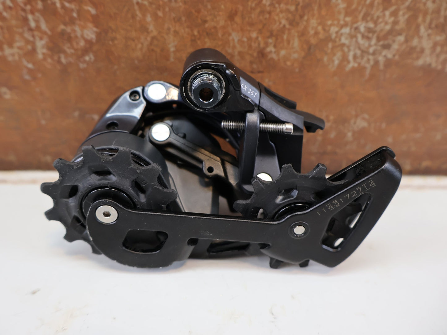 Schaltungsteile von Sram, SRAM FORCE ETAP AXS D1 SCHALTWERK / WIRELESS 12-FACH / MAX. 36Z ROAD COMPONENT vor USEDBIKES-OB.DE Hintergrund