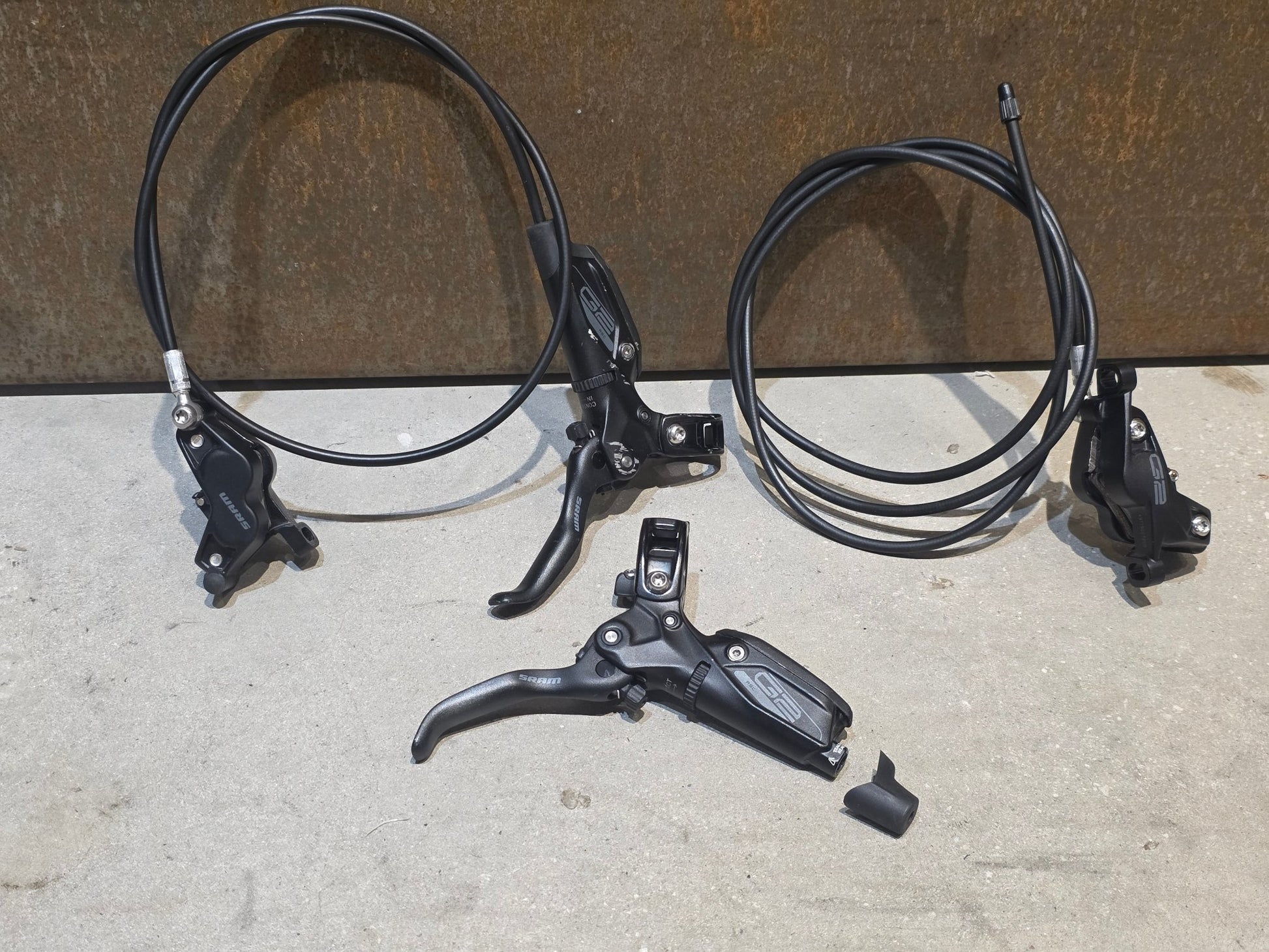 Bremse von Sram, SRAM G2 RSC 4 - KOLBEN BREMSE VORNE & HINTEN vor USEDBIKES - OB.DE Hintergrund