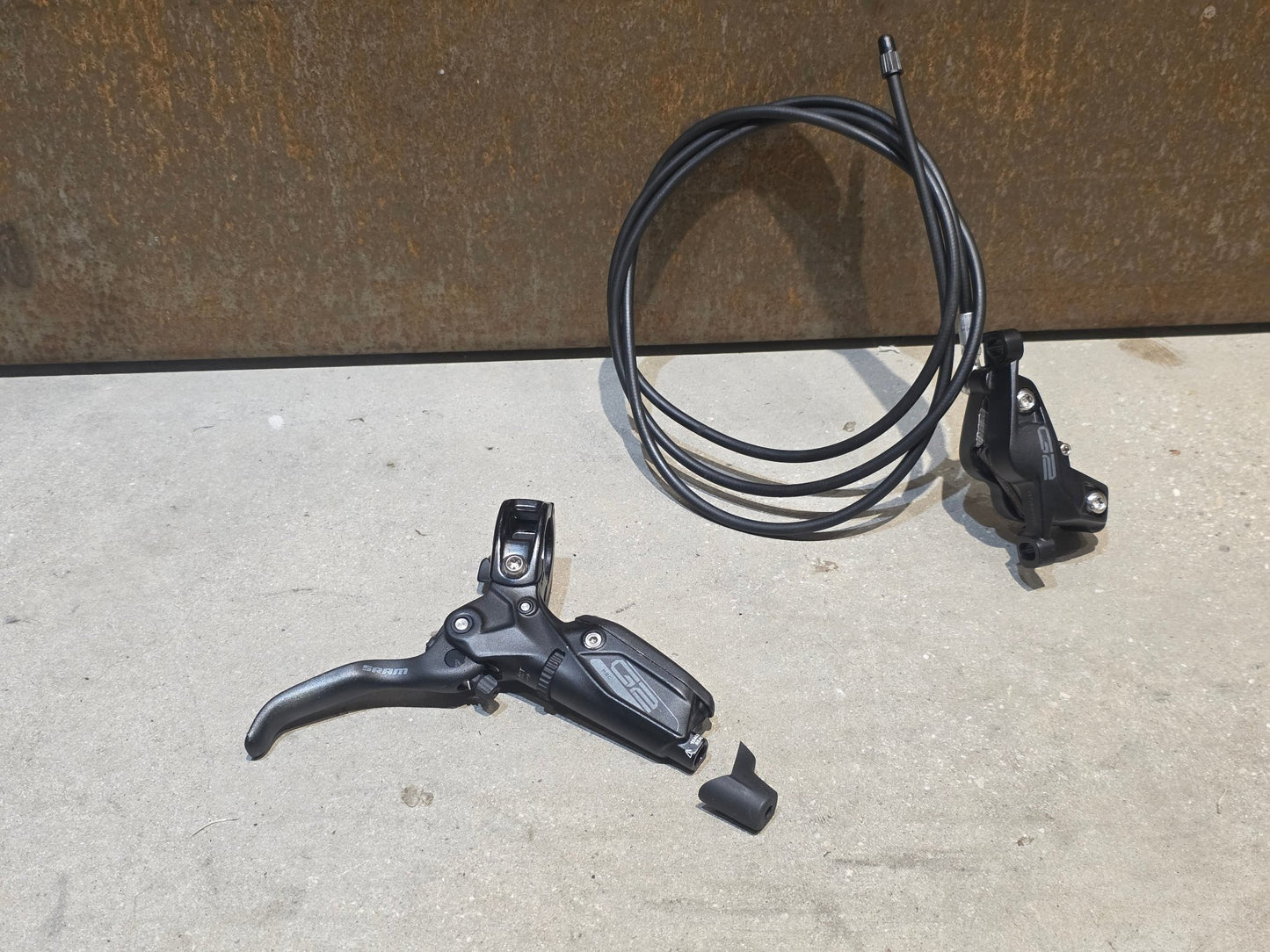 Bremse von Sram, SRAM G2 RSC 4 - KOLBEN BREMSE VORNE & HINTEN vor USEDBIKES - OB.DE Hintergrund