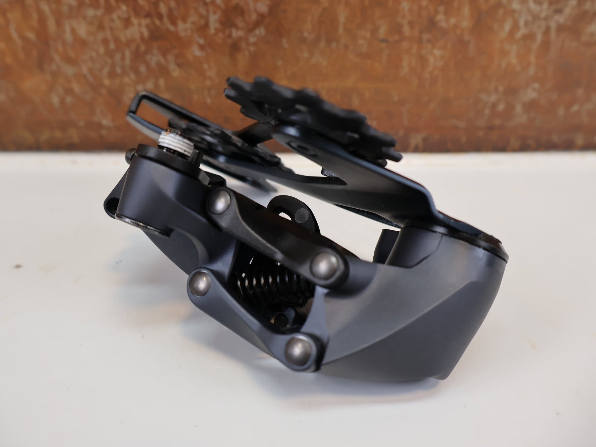 Schaltungsteile von Sram, SRAM GX EAGLE / 12-FACH MTB SCHALTWERK / TYPE 3.0 / LUNAR / 52 Z vor USEDBIKES-OB.DE Hintergrund