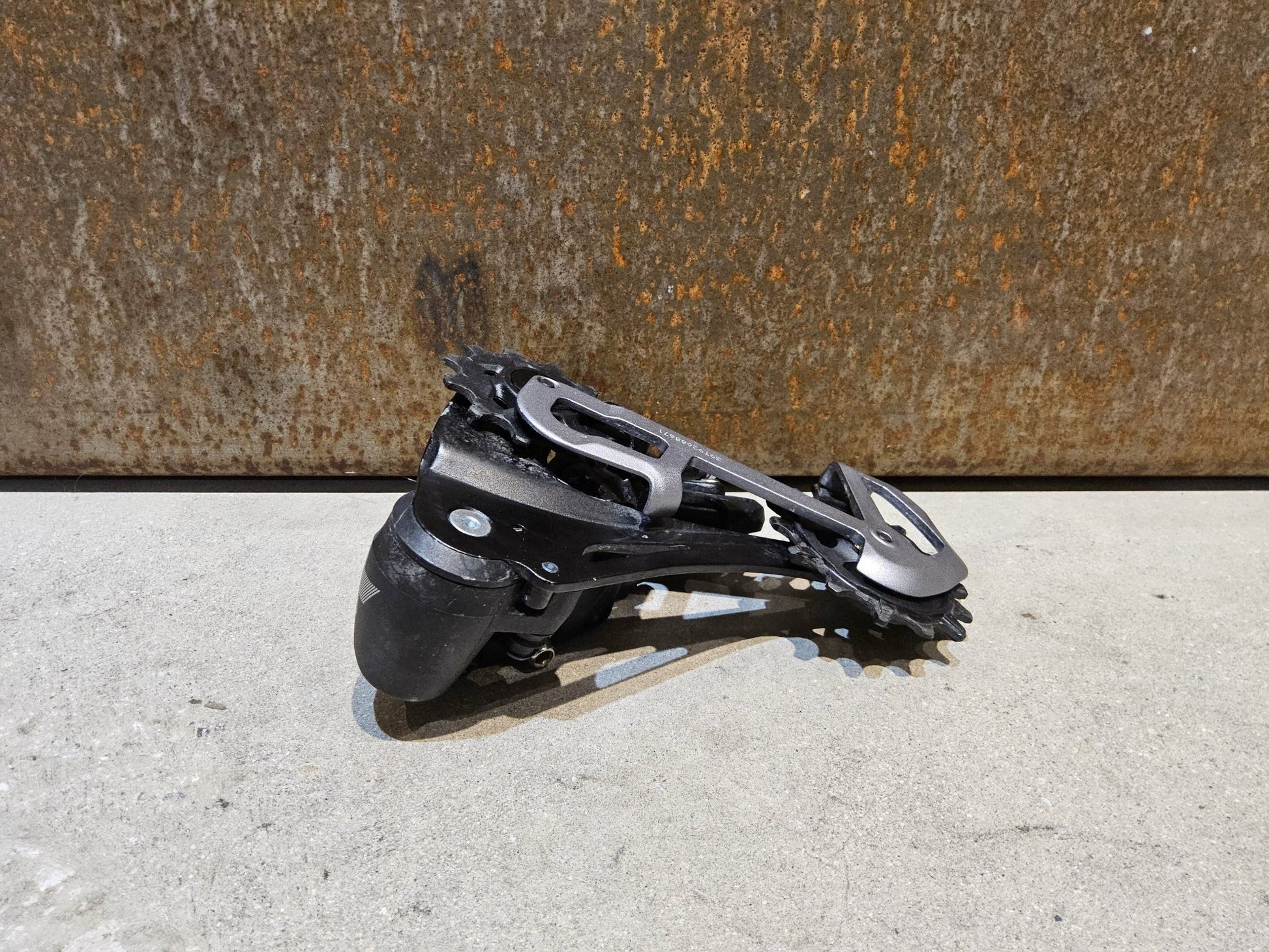Schaltungsteile von Sram, SRAM GX EAGLE SCHALTWERK 12 FACH / MAX. 50 ZÄHNE vor USEDBIKES - OB.DE Hintergrund