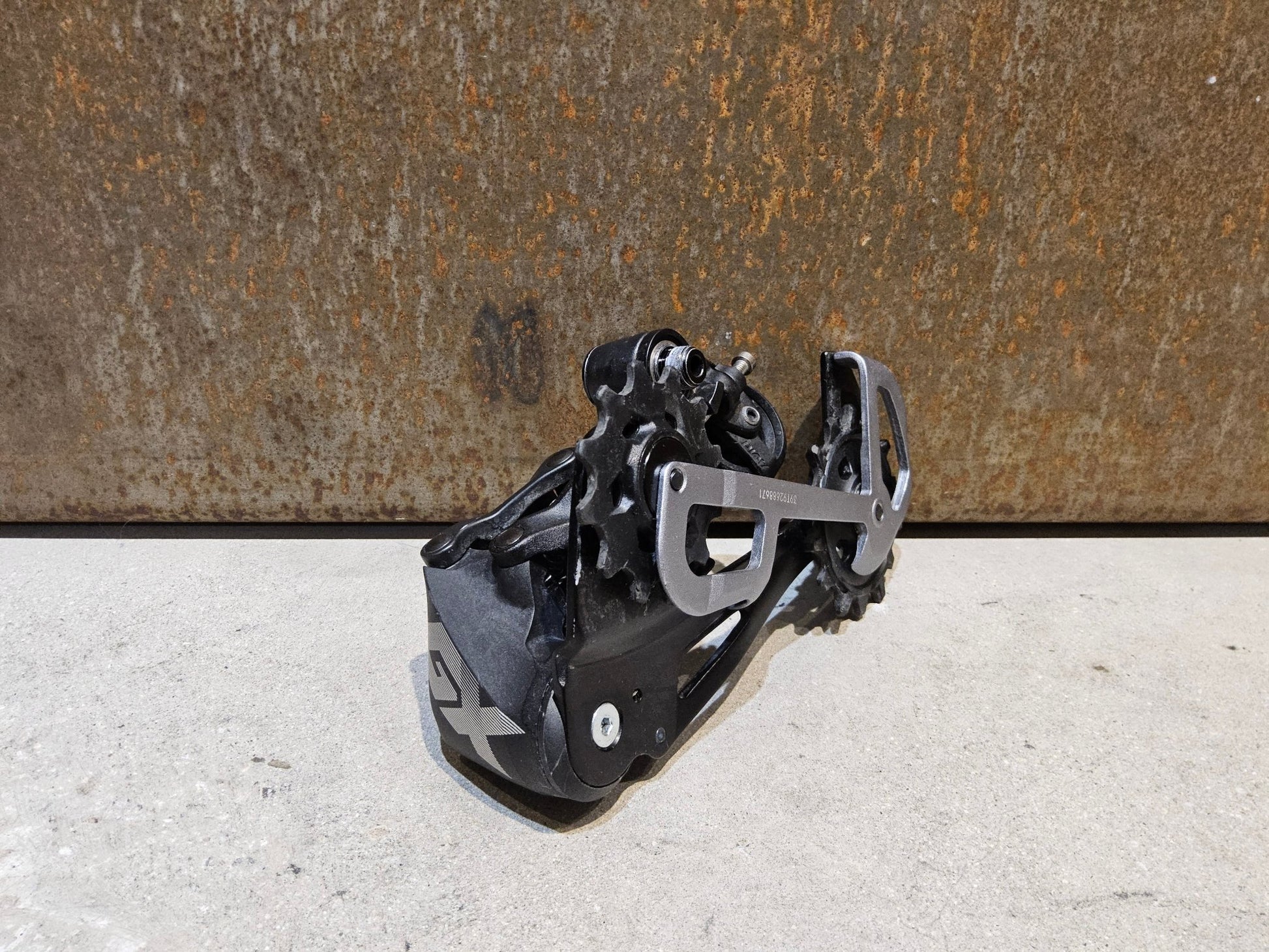 Schaltungsteile von Sram, SRAM GX EAGLE SCHALTWERK 12 FACH / MAX. 50 ZÄHNE vor USEDBIKES - OB.DE Hintergrund