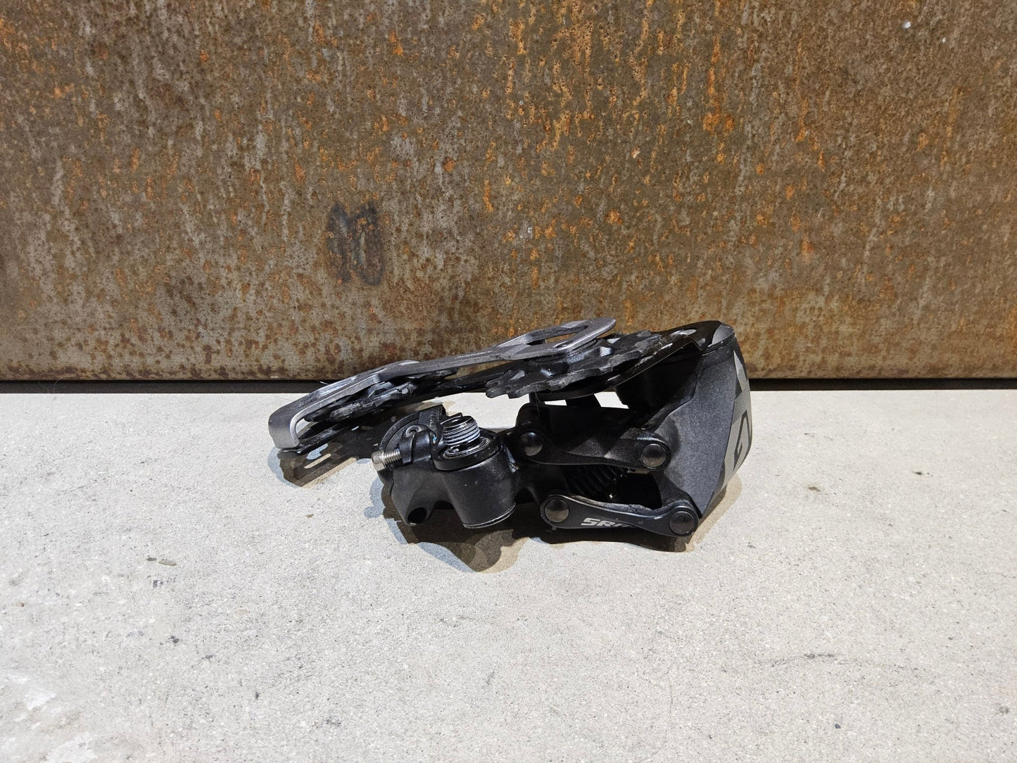 Schaltungsteile von Sram, SRAM GX EAGLE SCHALTWERK 12 FACH / MAX. 50 ZÄHNE vor USEDBIKES - OB.DE Hintergrund