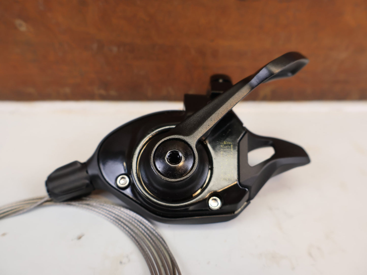 Schaltungsteile von Sram, SRAM GX EAGLE TRIGGER SCHALTHEBEL 12-FACH RECHTS HINTEN vor USEDBIKES-OB.DE Hintergrund