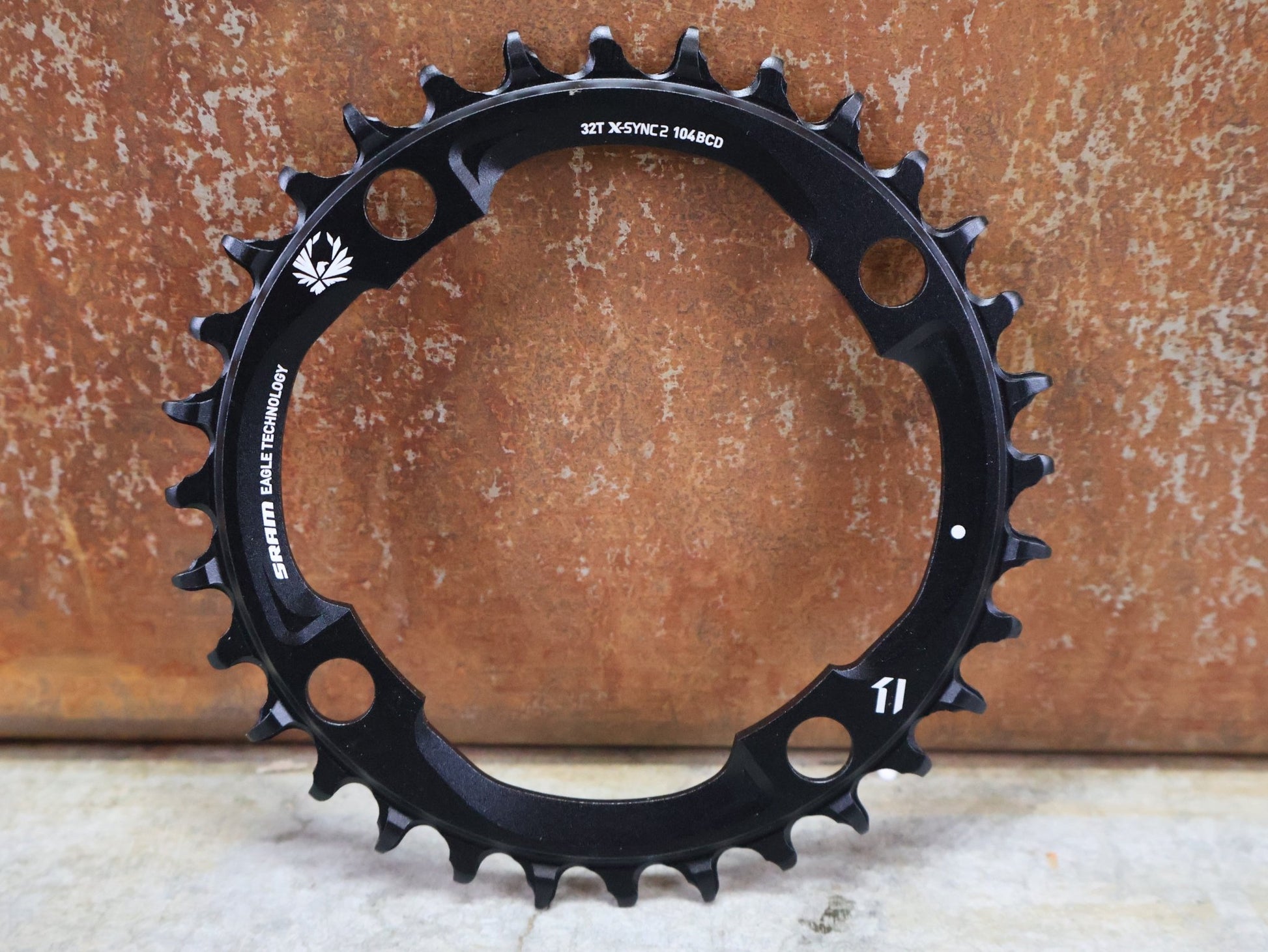 Kettenblatt von Sram, SRAM KETTENBLATT X - SYNC 2 FÜR X01 XX1 EAGLE 104 MM BCD 32T / 34T vor USEDBIKES - OB.DE Hintergrund