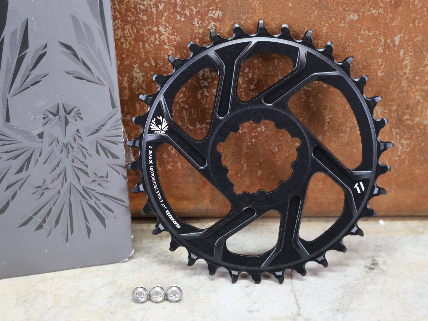 Kettenblatt von Sram, SRAM KETTENBLATT X - SYNC 2 XX1 EAGLE 3 BOLT DIRECT MOUNT 30T / 32T / 34T / 36T 3MM vor USEDBIKES - OB.DE Hintergrund