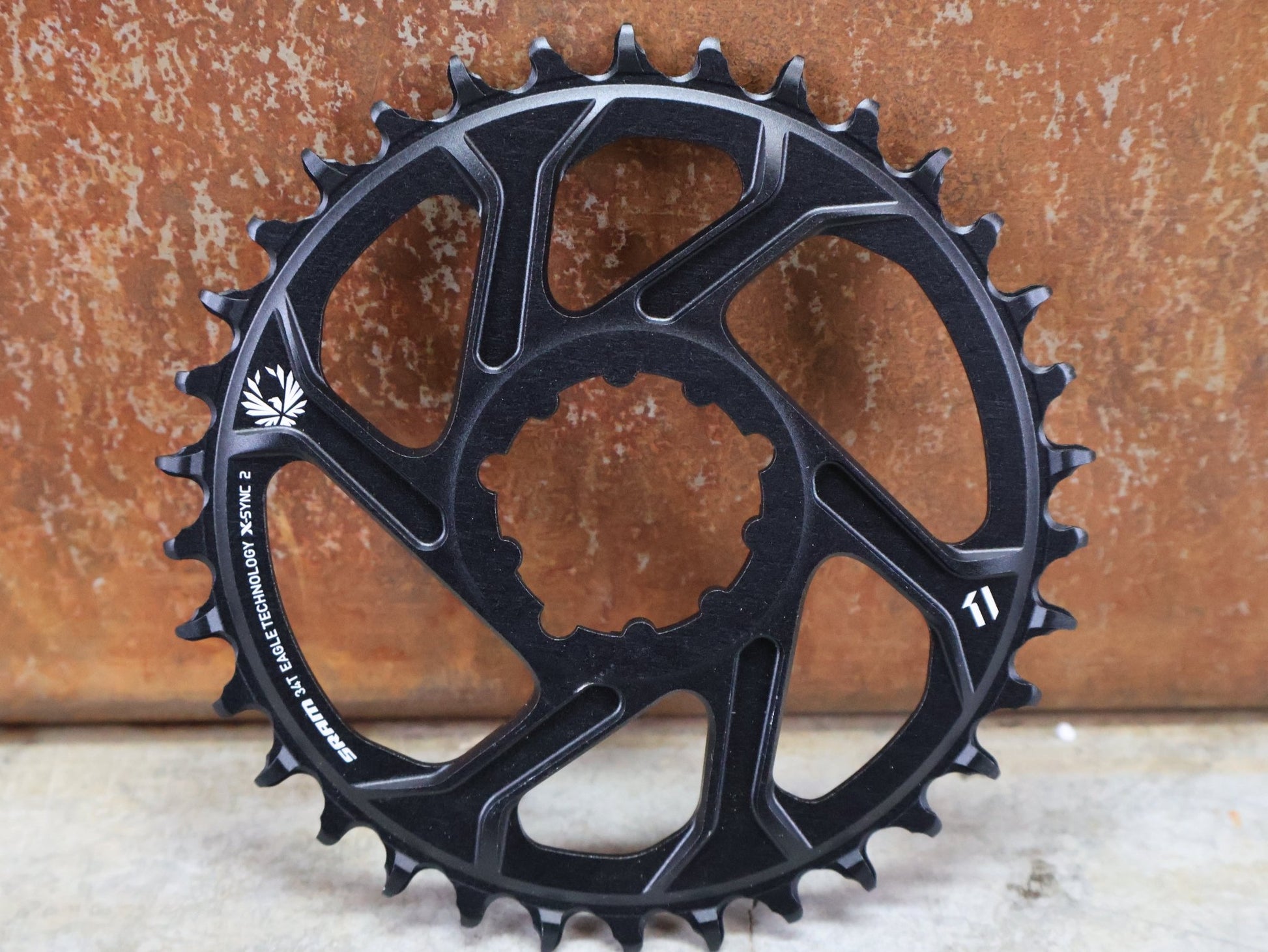 Kettenblatt von Sram, SRAM KETTENBLATT X - SYNC 2 XX1 EAGLE 3 BOLT DIRECT MOUNT 30T / 32T / 34T / 36T 3MM vor USEDBIKES - OB.DE Hintergrund