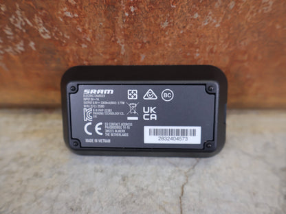 Zubehör von Sram, SRAM LADEGERÄT FÜR EAGLE / RED / FORCE / RIVAL / REVERB AXS & RED ETAP vor USEDBIKES - OB.DE Hintergrund