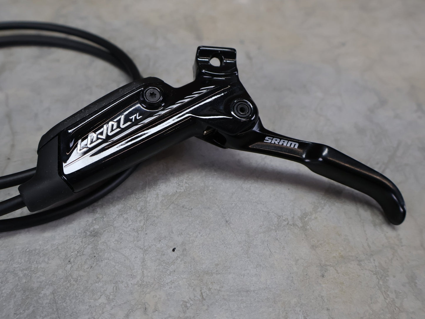 Bremse von Sram, SRAM LEVEL TL BREMSSET VORNE U. HINTEN SCHWARZ vor USEDBIKES - OB.DE Hintergrund