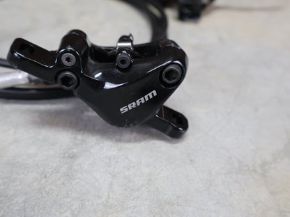Bremse von Sram, SRAM LEVEL TL BREMSSET VORNE U. HINTEN SCHWARZ vor USEDBIKES - OB.DE Hintergrund