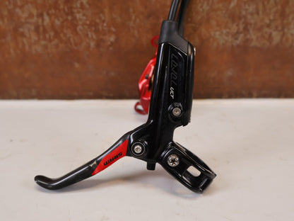 Bremse von Sram, SRAM Level Ultimate Bremsen Set Red Nino Schurter vor USEDBIKES-OB.DE Hintergrund