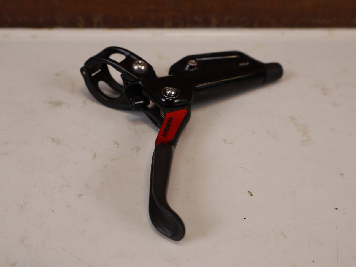 Bremse von Sram, SRAM Level Ultimate Bremsen Set Red Nino Schurter vor USEDBIKES-OB.DE Hintergrund