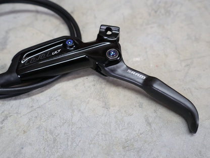 Bremse von Sram, SRAM LEVEL ULTIMATE BREMSSET VORNE U. HINTEN SCHWARZ / RAINBOW vor USEDBIKES - OB.DE Hintergrund