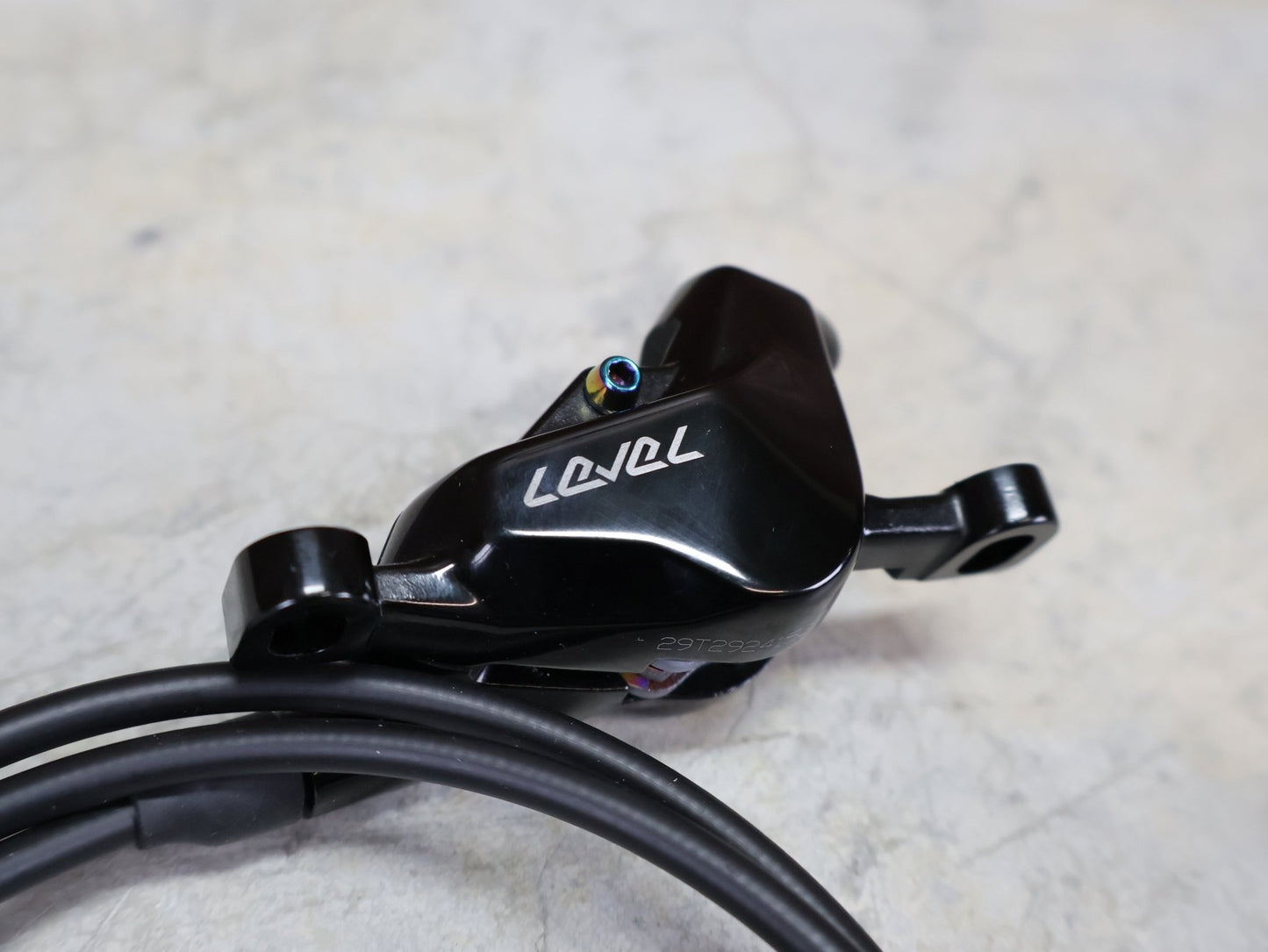 Bremse von Sram, SRAM LEVEL ULTIMATE BREMSSET VORNE U. HINTEN SCHWARZ / RAINBOW vor USEDBIKES - OB.DE Hintergrund