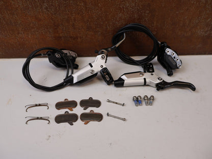 Bremse von Sram, SRAM Maven Ultimate B1 Scheibenbremsen Set VR HR Carbon vor USEDBIKES-OB.DE Hintergrund