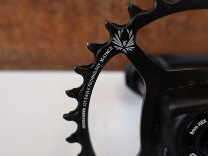 Kurbel von Sram, SRAM NX EAGLE DUB KURBELGARNITUR / 170MM / 32T / 3MM OFFSET / 1X12 - FACH vor USEDBIKES - OB.DE Hintergrund