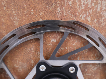 Bremsscheibe von Sram, SRAM Paceline Center Lock Bremsscheiben Set 160mm 2er Pack vor USEDBIKES-OB.DE Hintergrund
