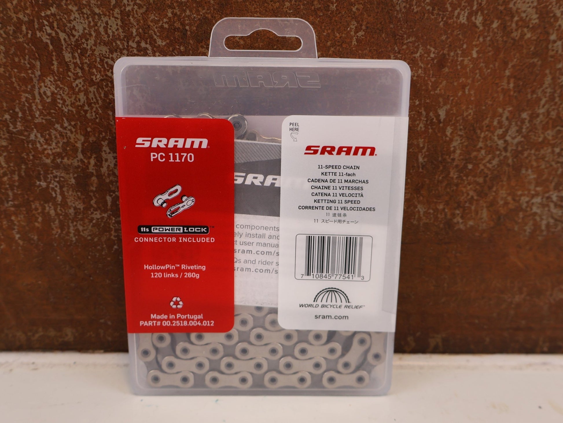 Kette von Sram, SRAM PC 1170 KETTE 11 FACH SILBER 120 GLIEDER vor USEDBIKES-OB.DE Hintergrund