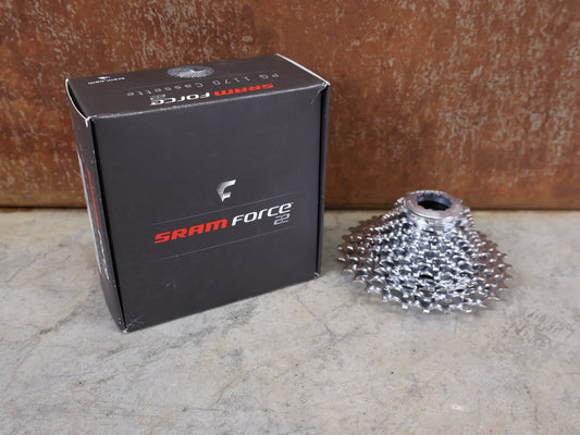 Kassette & Zahnkränze von Sram, SRAM POWERGLIDE PG - 1170 KASSETTE / 11 - FACH / 11 - 28 ZÄHNE / ROAD & CX / 257G vor USEDBIKES - OB.DE Hintergrund