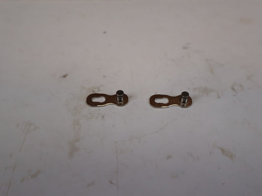 Kette von Sram, SRAM POWERLOCK KETTENSCHLOSS 11 FACH SILBER 1 PAAR vor USEDBIKES-OB.DE Hintergrund