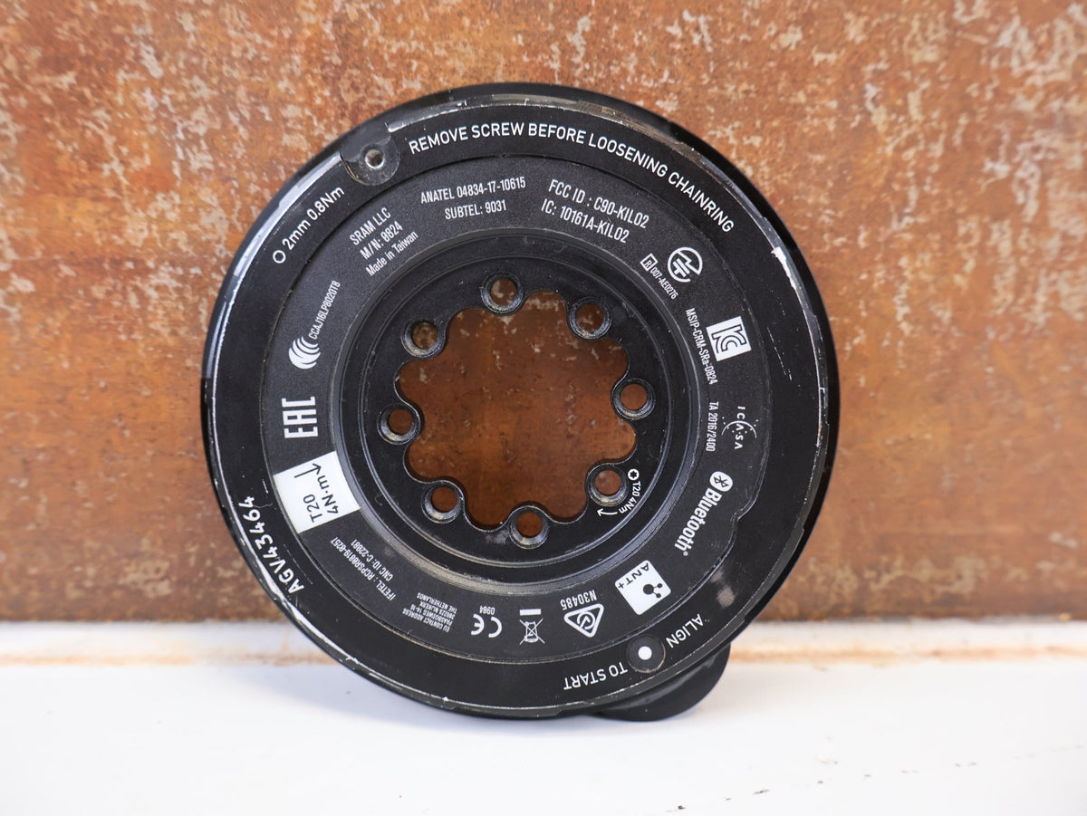Powermeter von Sram, SRAM QUARQ POWER METER SPIDER LEISTUNGSMESSER XX SL AXS vor USEDBIKES-OB.DE Hintergrund