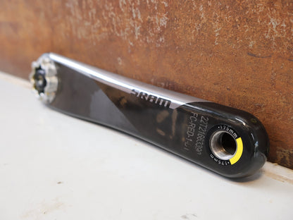Kurbel von Sram, SRAM RED AXS D1 CARBON ROAD KURBELARME 8-BOLT DUB / 175MM vor USEDBIKES-OB.DE Hintergrund