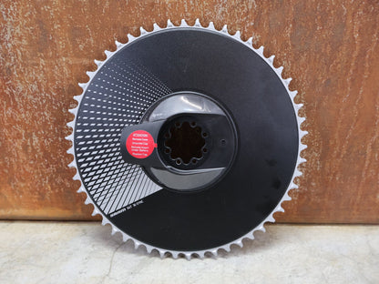 Kettenblatt von Sram, SRAM – RED AXS D1 POWER SENSOR KIT / POWERMETER / 54 ZÄHNE / 1 FACH / QUARQ DZERO vor USEDBIKES - OB.DE Hintergrund