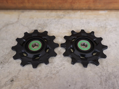 Zubehör von Sram, SRAM – RED AXS D1 SCHALTROLLEN - SET / 12 - FACH / KERAMIK vor USEDBIKES - OB.DE Hintergrund