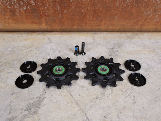 Zubehör von Sram, SRAM – RED AXS D1 SCHALTROLLEN - SET / 12 - FACH / KERAMIK vor USEDBIKES - OB.DE Hintergrund