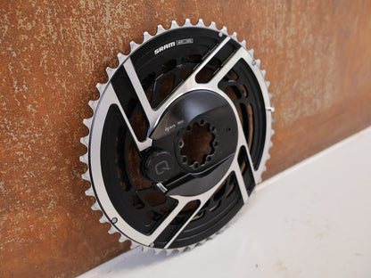 Powermeter von Sram, SRAM RED AXS E1 POWERMETER KIT 48-35T / BASTLERWARE vor USEDBIKES-OB.DE Hintergrund