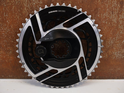 Powermeter von Sram, SRAM RED AXS E1 POWERMETER KIT 48-35T / BASTLERWARE vor USEDBIKES-OB.DE Hintergrund