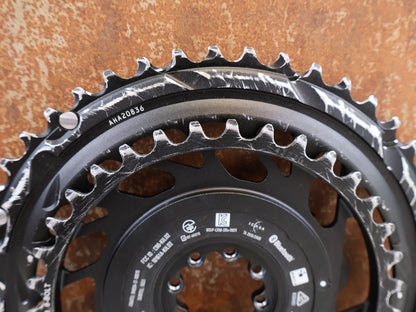 Powermeter von Sram, SRAM RED AXS E1 POWERMETER KIT 48-35T / BASTLERWARE vor USEDBIKES-OB.DE Hintergrund