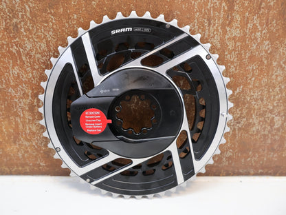 Kurbel von Sram, SRAM RED AXS E1 POWERMETER - KIT MY25 / 46 - 33 ZÄHNE / 8 - BOLT vor USEDBIKES - OB.DE Hintergrund