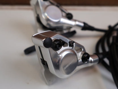 Brems-/ Schalthebel von Sram, SRAM RED AXS E1 SCHALT-BREMSHEBEL + HYDR. SCHEIBENBREMSE SET vor USEDBIKES-OB.DE Hintergrund